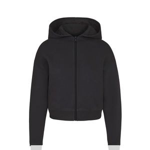 SKIMS hoodie and jogger set in the color soot